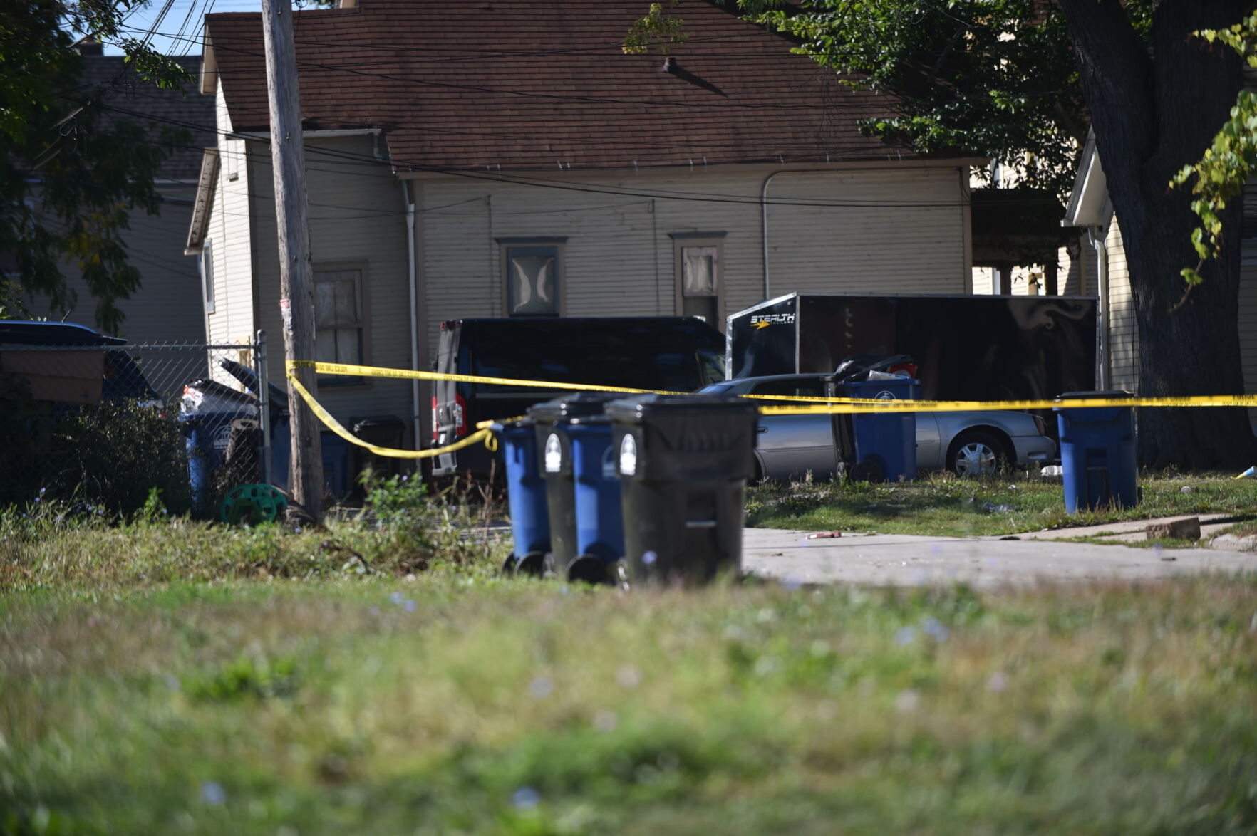 From scene of triple shooting on Racine Street, as of Monday morning